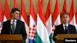 Premierul Ungariei, Vikto Orban, și președintele croat Zoran Milanović