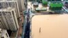 CHINA -- An aerial view shows the flooded areas following heavy rainfall in Zhengzhou, Henan province, China July 21, 2021. Picture taken with a drone. cnsphoto via REUTERS ATTENTION EDITORS - THIS IMAGE WAS PROVIDED BY A THIRD PARTY. CHINA OUT.