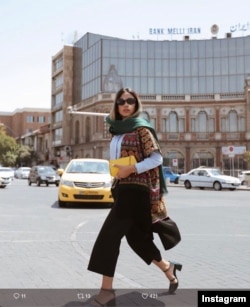 Young woman, downtown Tehran (Hasan Abad sqaure). From Instagram page.