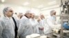 Armenia -- Prime Minister Nikol Pashinian (second from left) visits a new cheese factory opened by the Spayka company in Yerevan, March 26, 2019.