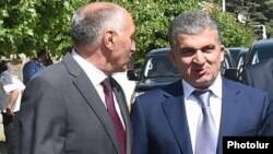 Armenia - Vachagan Ghazarian (R), President Serzh Sarkisian's chief bodyguard, is pictured at an official event in Yerevan, 11 July 2015.