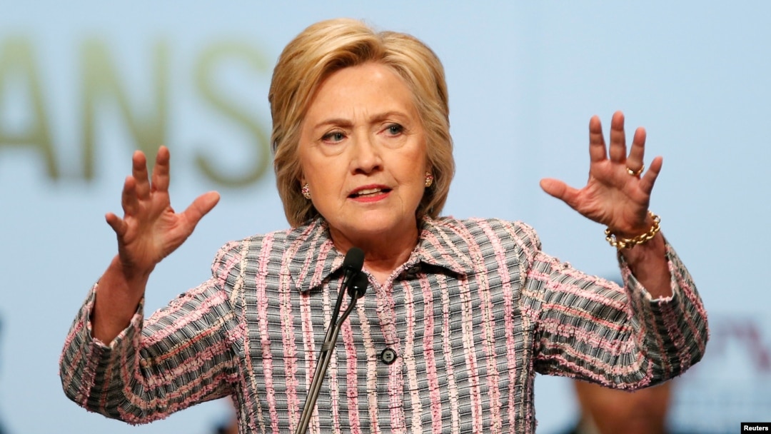 U.S. Democratic presidential candidate Hillary Clinton gestures as she speaks at the Veterans of Foreign Wars Convention in Charlotte, North Carolina, on July 25.