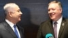 Israeli Prime Minister Benjamin Netanyahu (left) and U.S. Secretary of State Mike Pompeo talk to the press on the sidelines of a session at the conference in Warsaw on February 14.