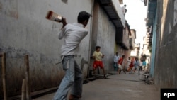 Wherever the British went, they took cricket with them, and it has flourished, as here, in Mumbai.