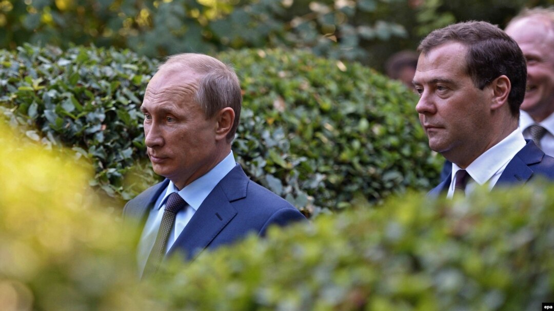 Russian President Vladimir Putin (left) and Russian Prime Minister Dmitry Medvedev visit the Anton Chekhov House-Museum in Yalta, in the annexed Ukrainian region of Crimea, in August 2014. 