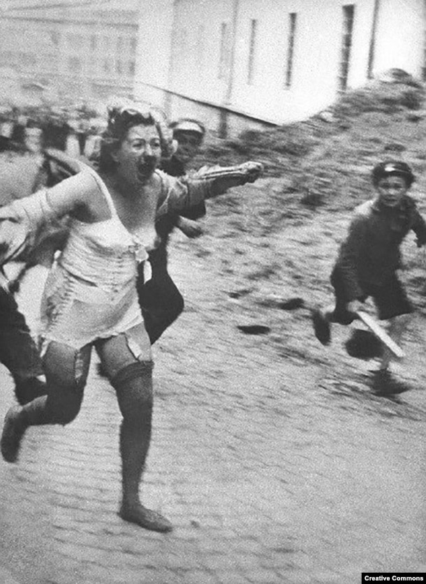 With the active encouragement of the Nazis, horror is unleashed on the Jewish population of the Soviet Ukraine and territories that had been occupied by Soviet forces. This woman is fleeing from a mob in Lviv, a Polish city overtaken by Soviet and then Nazi forces that is today part of western Ukraine -- in June or July 1941. Thousands of Jews were tormented and murdered by mobs of locals during a series of pogroms in Central and Eastern Europe.&nbsp; &nbsp;