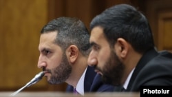 Armenia - Speaker Ruben Rubinian and his deputy Vahagn Aleksanian (right) hold a parliament session, Yerevan, August 17, 2026.