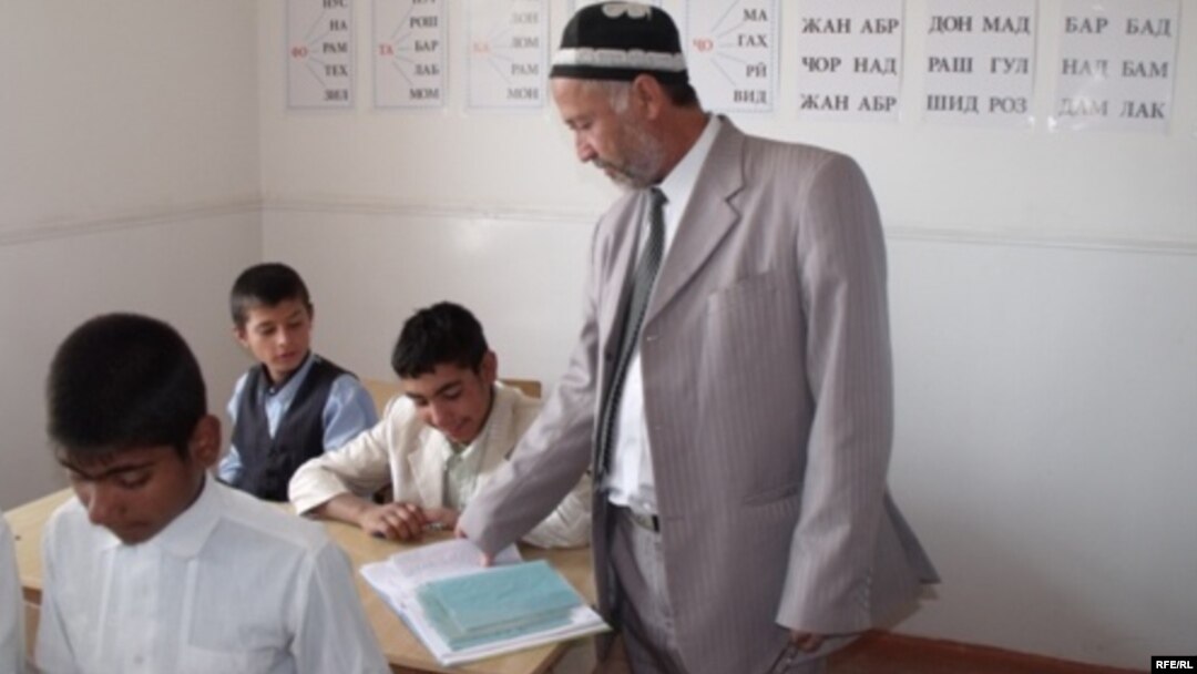 A teacher at a school in Tajikistan's Vose region