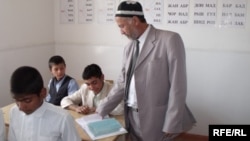 A teacher at a school in Tajikistan's Vose region