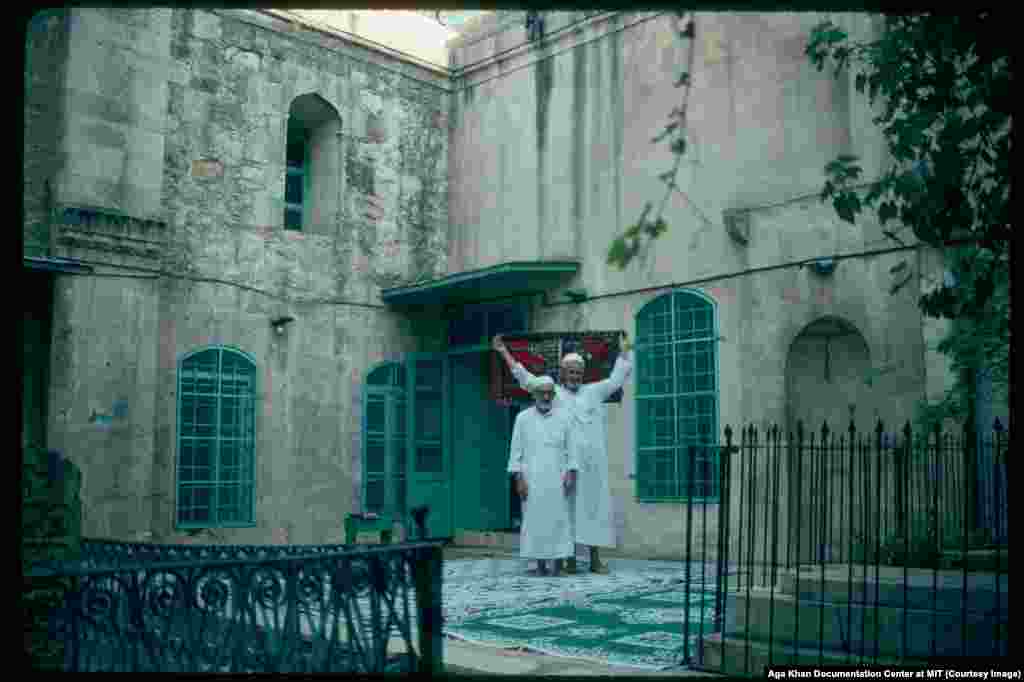 Men in the courtyard of Chalabi Mosque in 1991.&nbsp;After French rule collapsed, Syria suffered considerable turmoil before a 1970 coup installed the Alawite Hafez al-Assad as prime minister, then president. Assad, an air-force officer who had spent 10 months in the U.S.S.R. training as a fighter pilot, imposed a ruthless, secular-leaning police state on Syria.