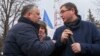 Are Moldovan Socialist Party leader Igor Dodon (left) and Our Party leader Renato Usatii fighting corruption -- or just trying to take Moldova back to Moscow?