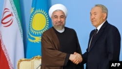 Президент Казахстана Нурсултан Назарбаев принимает в Астане президента Ирана Хасана Роухани. 9 сентября 2014 года.