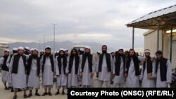 Newly freed Taliban prisoners are seen at Bagram prison, north of Kabul, on April 9.