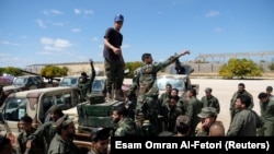 Fighters from the self-styled Libyan National Army under the command of Khalifa Haftar