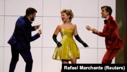 Moldova's DoReDoS performs My Lucky Day during a dress rehearsal for the grand final of the Eurovision Song Contest in Lisbon.