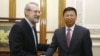 Iran's parliament speaker Ali Larijani meeting China's Song Tao in Tehran on July 30, 2019.