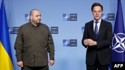 Rustem Umerov (left), in his then capacity as Ukraine's defense minister, with NATO chief Mark Rutte in February