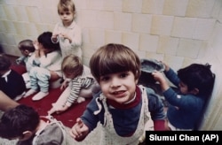 Romanian orphans pass the hours without toys at Bucharest's Number One Orphanage in 1991.