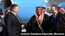 U.S. Secretary of State Mike Pompeo (left) is greeted by Bahraini Foreign Minister Khalid bin Ahmad al-Khalifa after arriving in Manama on January 11.