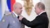 Russian President Vladimir Putin decorates General Sergei Surovikin for his work in Syria at a ceremony in Moscow in 2017.