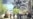 Local officials are pictured in Tuapse, a Black Sea port in southwestern Russia, on April 28 as smoke from a massive blaze rises in the background. Ukraine launched drone strikes on the oil refinery for the third time in two weeks.<br>