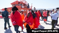 Migranţi în Spania