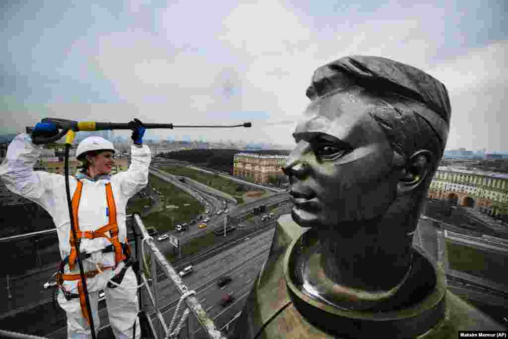 A worker in Moscow cleans the statue of Yury Gagarin, the first man in space, ahead of Cosmonautics Day, which is celebrated on April 12. (AP/Maxim Marmur)