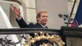Former dissident leader and leading Civic Forum member Vaclav Havel waves to wellwishers on December 29, 1989, shortly after he took the oath as president of Czechoslovakia.