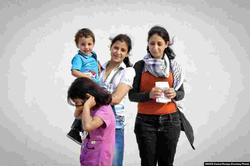 Lina fled Gaza in 2010, traveling through Egypt, Libya, and Jordan before reaching Romania. The most important things the single Palestinian mother brought with her were letters and drawings from her four children -- Alia, Lana, Adam, and Ragheb -- whom she had to leave in Jordan for nine months until she got refugee status in Romania and they could reunite.