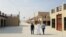 Residents walk at a new state-run development project in the old quarter of Shi'ite town Awamiya, Saudi Arabia January 8, 2019. REUTERS/Stephen Kalin
