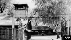 Auschwitz concentration camp gate, with the inscription "Arbeit macht frei", after its liberation by Soviet troops in January 1945