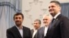 President Mahmud Ahmadinejad, left, shakes hands with Armenian Prime Minister Tigran Sarkisian