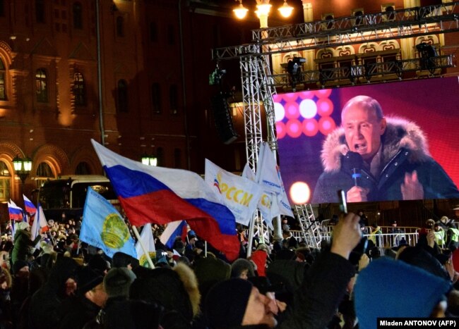 Қырым аннексияның 4 жылдығына арналған митинг-концертке келген Владимир Путин. Мәскеу. 18 наурыз 2018 жыл.