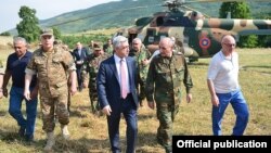 Nagorno Karabakh - Armenia's President Serzh Sarkisian (C), visits a military base, 22Jun2016