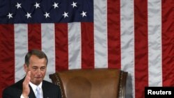 U.S. -- Incoming House Speaker John Boehner salutes the assembled members of congress as he takes the podium in front of the speaker's chair after being elected Speaker, Washington, DC, 05Jan2011