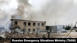 Firefighters try to extinguish a fire at the Polyplast chemical plant in the northwestern city of Kingisepp on January 16.