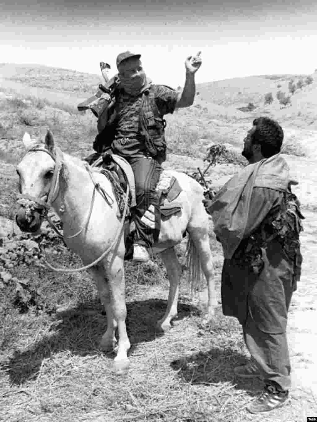 Tajik soldiers near Kabodien in August 1997 (TASS)