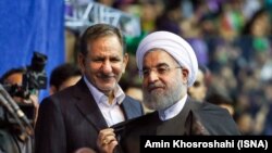 President Hassan Rouhani (R) and his First Vice President Es'hagh Jahangiri, during a campaign rally in Tehran on Sunday May 13, 2017.