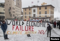 Activiștii protestează împotriva Forumului Economic Mondial. Davos, 15 ianuarie 2023.