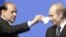 Ռուսաստանի նախագահ Վլադիմիր Պուտինը և Իտալիայի վարչապետ Սիլվիո Բեռլուսկոնին ռուսաստանյան Լիպեցկ քաղաքում ասուլիսի ժամանակ, 21-ը ապրիլի, 2004թ․