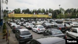 Long line of cars at a gas station after news agencies said cheap gasoline will be rationed, May 01, 2019.