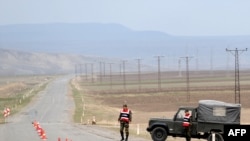 Turkey -- Turkish soldiers stand guard on a road at Dogu Kapi border gate with Armenia, in Kars, Akyaka province, 15Apr2009