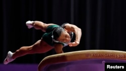 Оксана Чусовитина из Узбекистана во время выступления на Азиатских играх в Индонезии. Джакарта, 23 августа 2018 года.