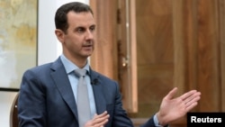 Syrian President Bashar al-Assad speaks during an interview with Yahoo News on February 10.