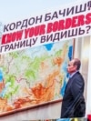 лакат із зображенням керівника РФ Володимира Путіна на акції протесту проти окупації Росією українського Криму. Вашингтон, 6 березня 2014 року