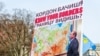 лакат із зображенням керівника РФ Володимира Путіна на акції протесту проти окупації Росією українського Криму. Вашингтон, 6 березня 2014 року