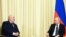 Belarusian strongman Alyaksandr Lukashenka (left) and Russian President Vladimir Putin (file photo)