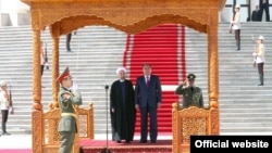 Президент Таджикистана Эмомали Рахмон и президент Ирана Хасан Роухани.
