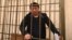 Kazakh activist Muratbek Tunghyshbaev appears at a Kyrgyz court hearing last month.