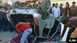 Angry protesters in the city of Urmia damaged a School janitor's car after alleged assault of a 12 years old schoolgirl. October 23, 2017.